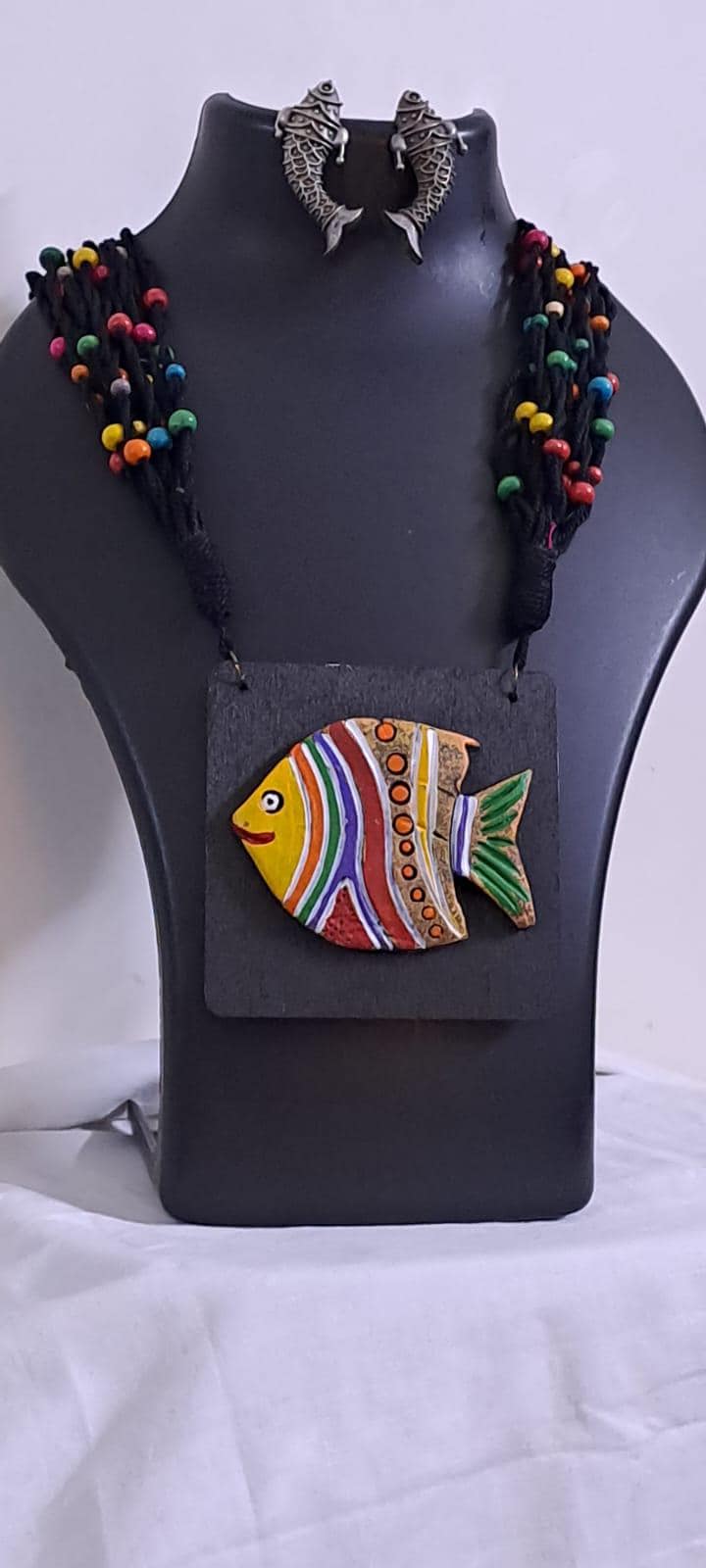 Terracotta fish pendant and thread necklace