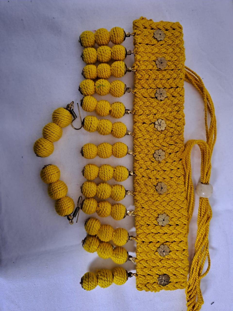 Yellow braided choker necklace set with fringes and matching earrings