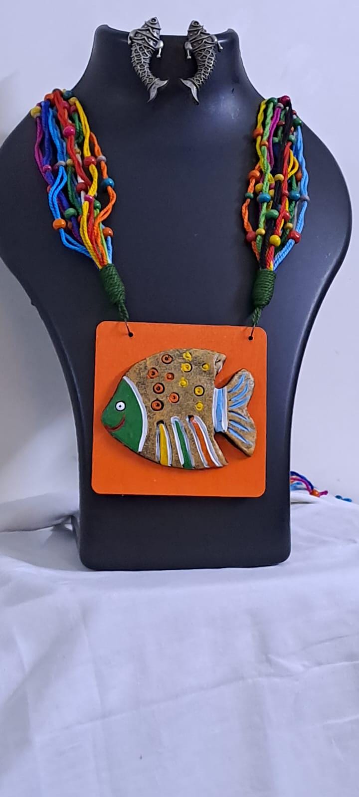 Terracotta fish pendant and thread necklace
