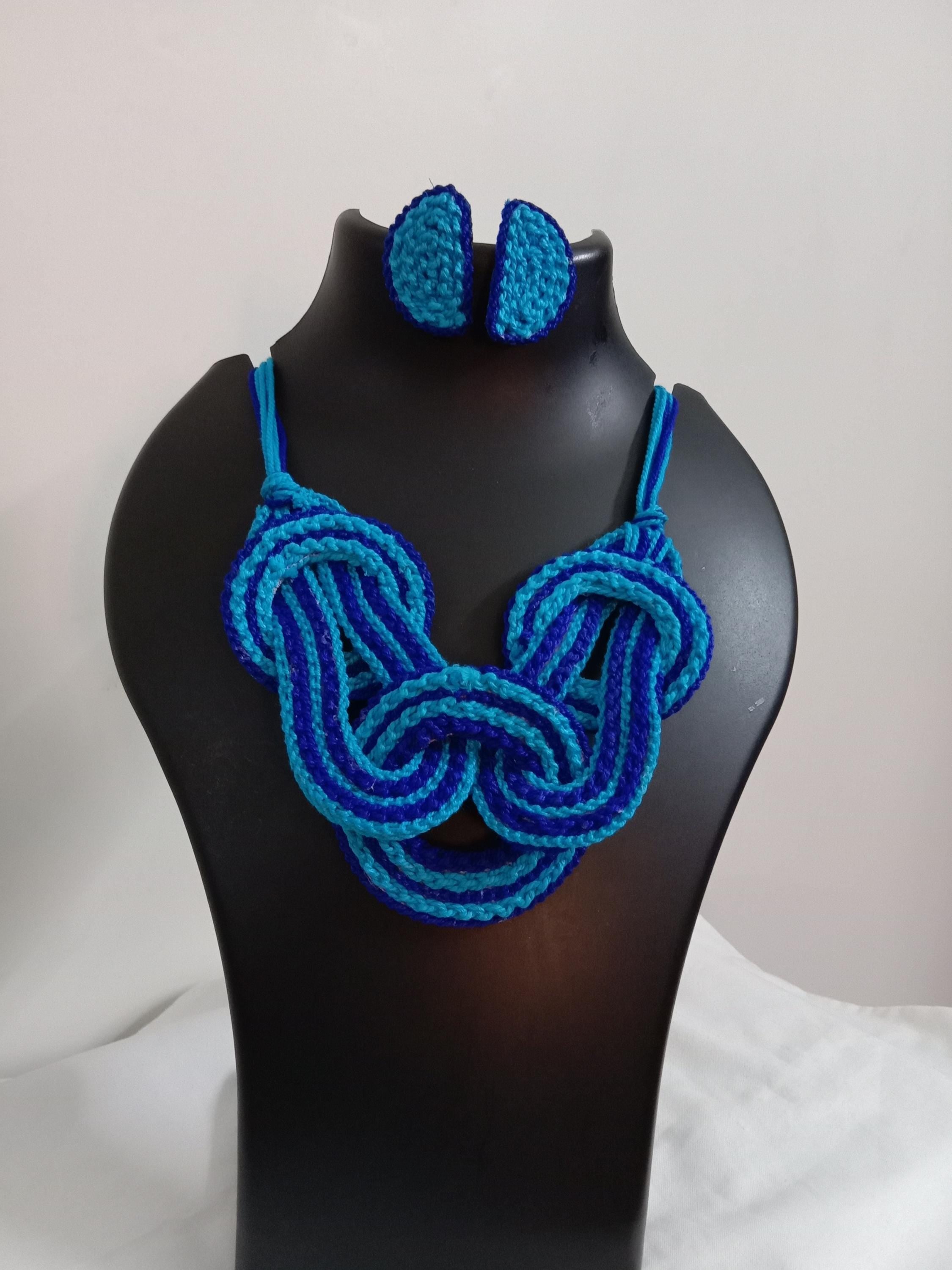 Celtic knot thread necklace with matching thread earrings.