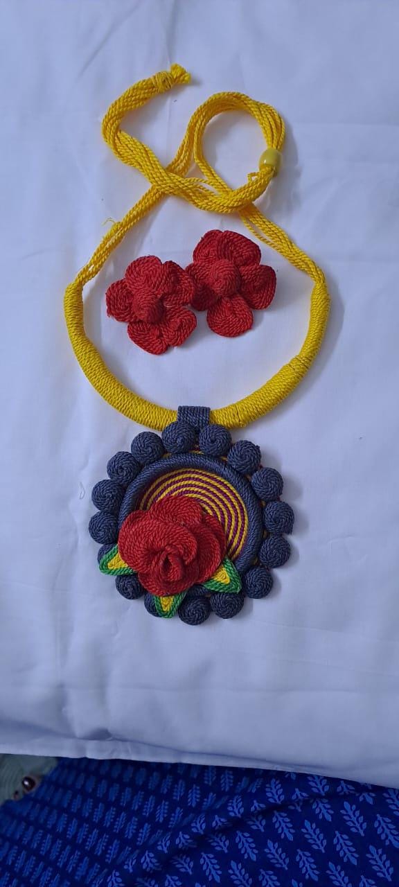 Exclusive multicoloured thread necklace set with round thread pendant n matching flower earrings