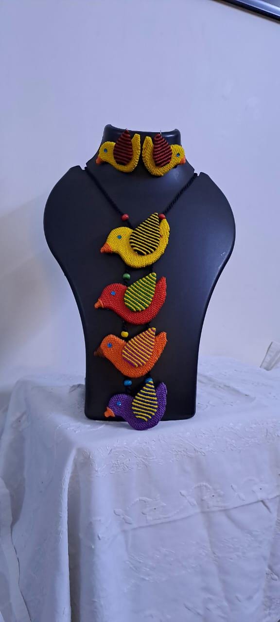 Multi coloured bird necklace and matching earrings