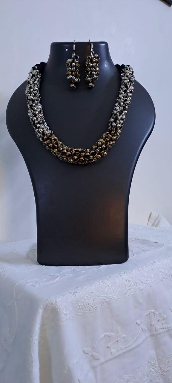 Exclusive silver oxidised traditional trinket beads necklace and matching earrings