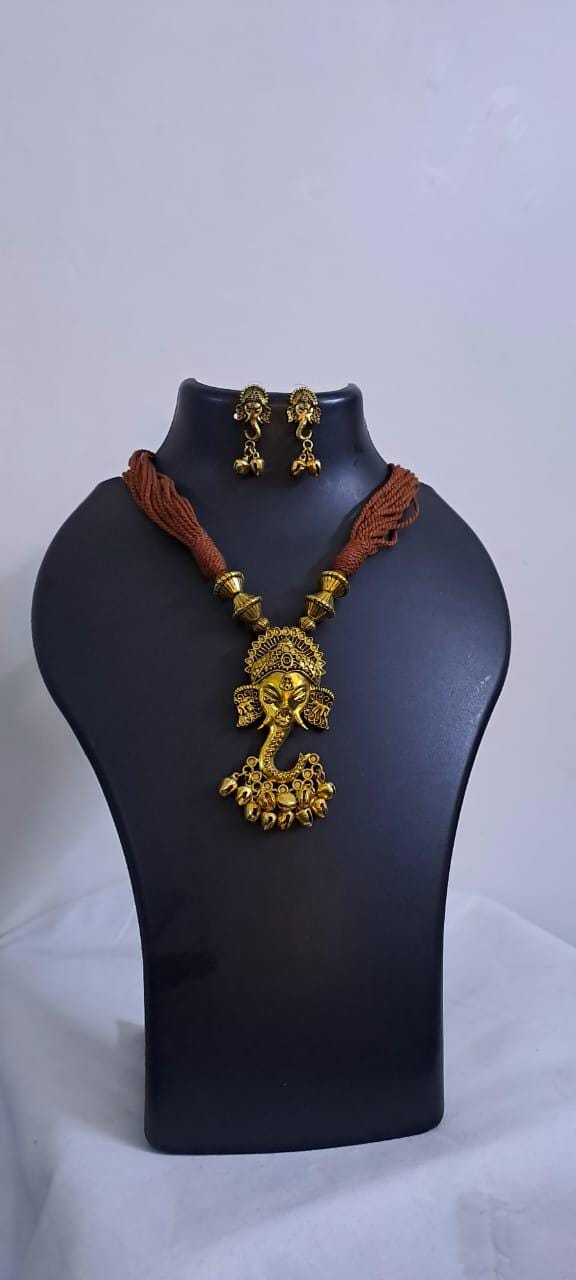 Brown thread necklace with Golden oxidised traditional pendant