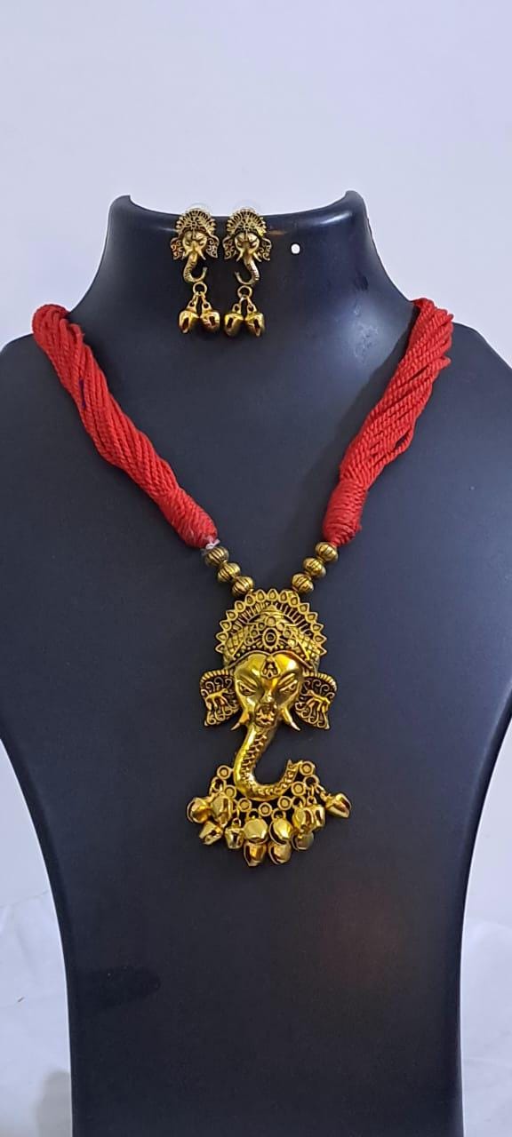 Red thread necklace with Golden oxidised traditional pendant