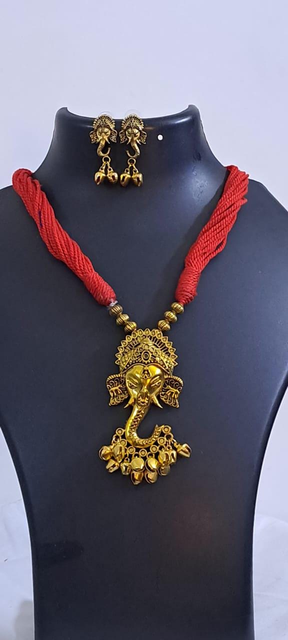 Red thread necklace with Golden oxidised traditional pendant