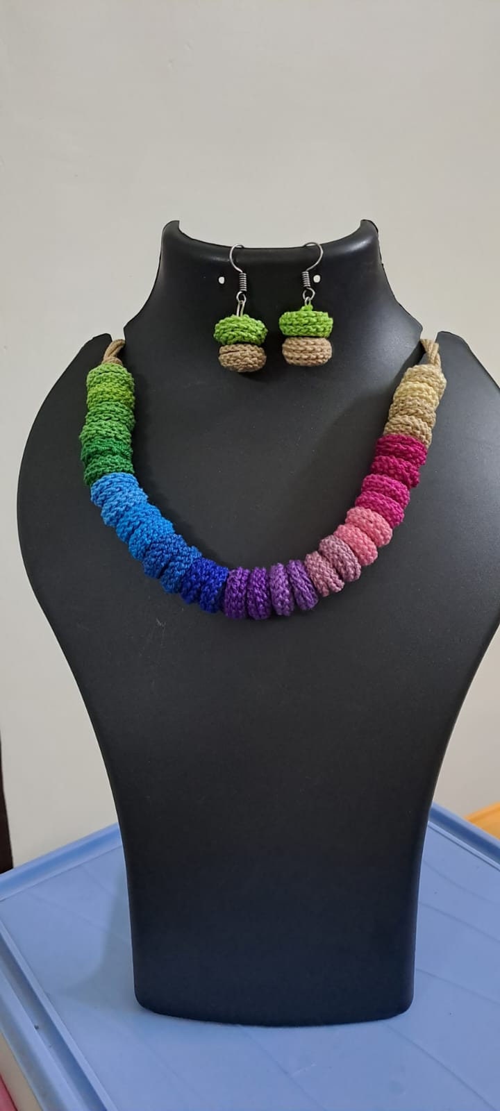 Exclusive multi coloured crochet necklace with colouful matching earrings.