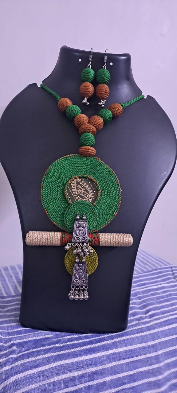 Exclusive green n brown thread beads necklace set with round thread n silver oxidised pendant n matching earrings
