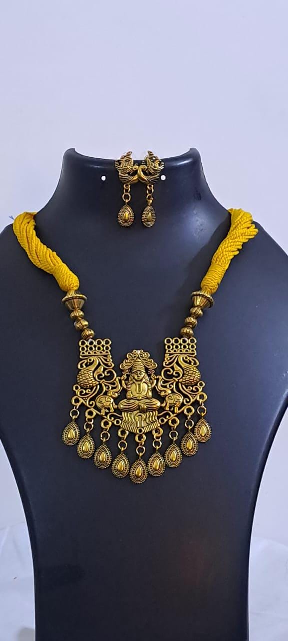 Yellow thread necklace with Golden oxidised traditional pendant