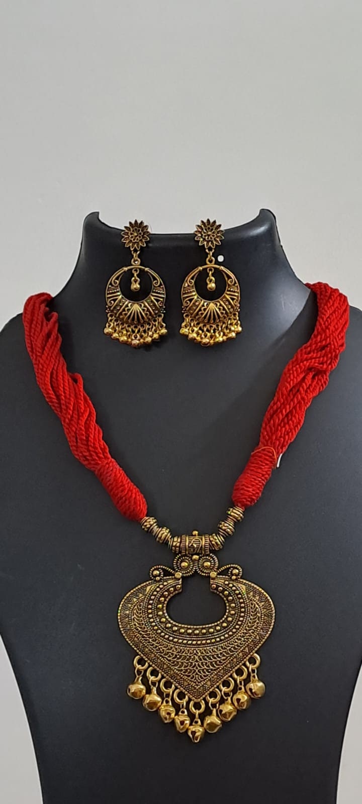Red thread necklace with Golden oxidised traditional pendant