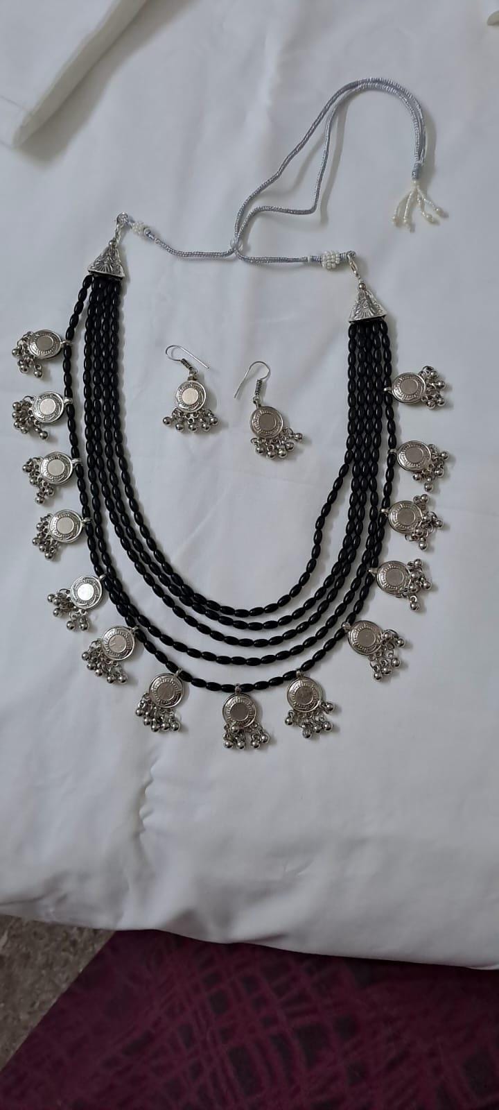 Exclusive multi layered  black glass beads necklace set with silver oxidised charms n matching earrings