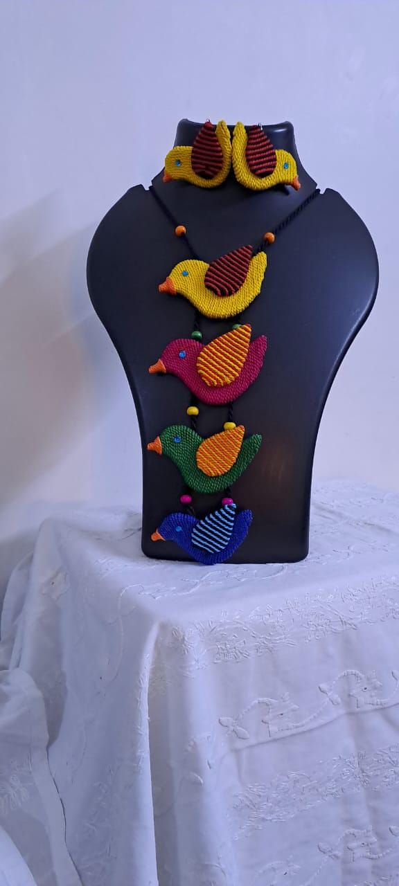 Multi coloured bird necklace and matching earrings