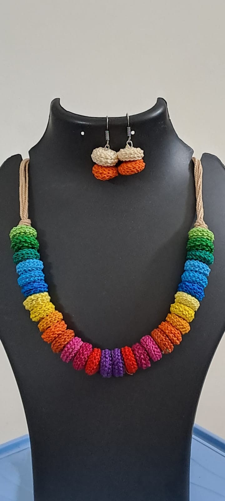 Exclusive multi coloured crochet necklace with colouful matching earrings.