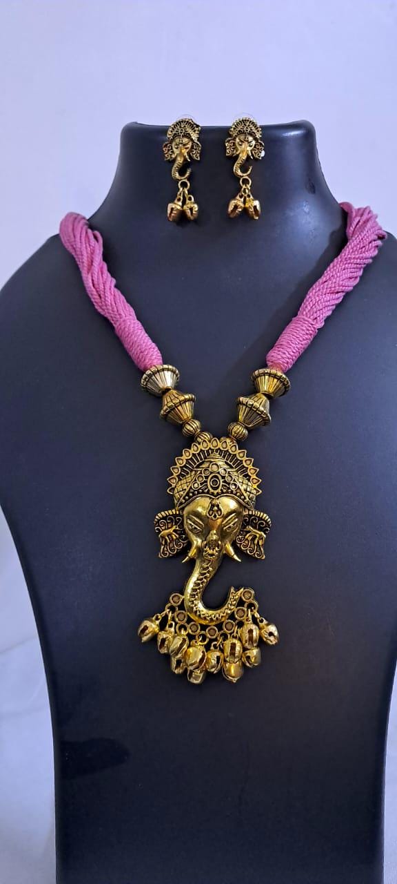 Pink thread necklace with Golden oxidised traditional pendant