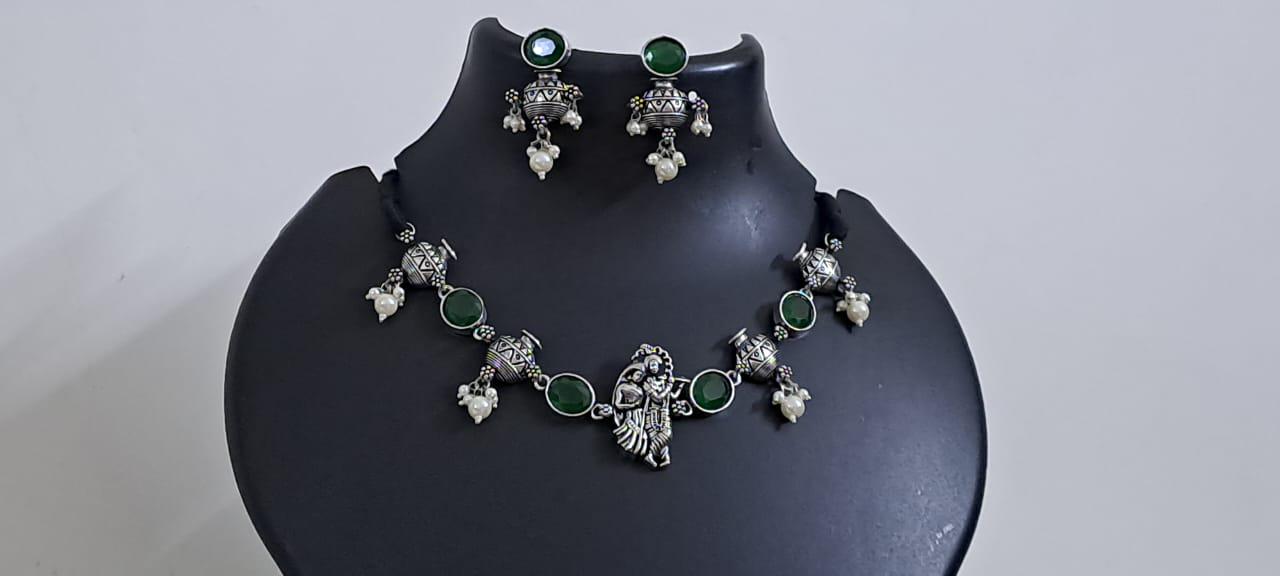 Exclusive silver oxidised lstone necklace with radha krishna pendant with matching earrings