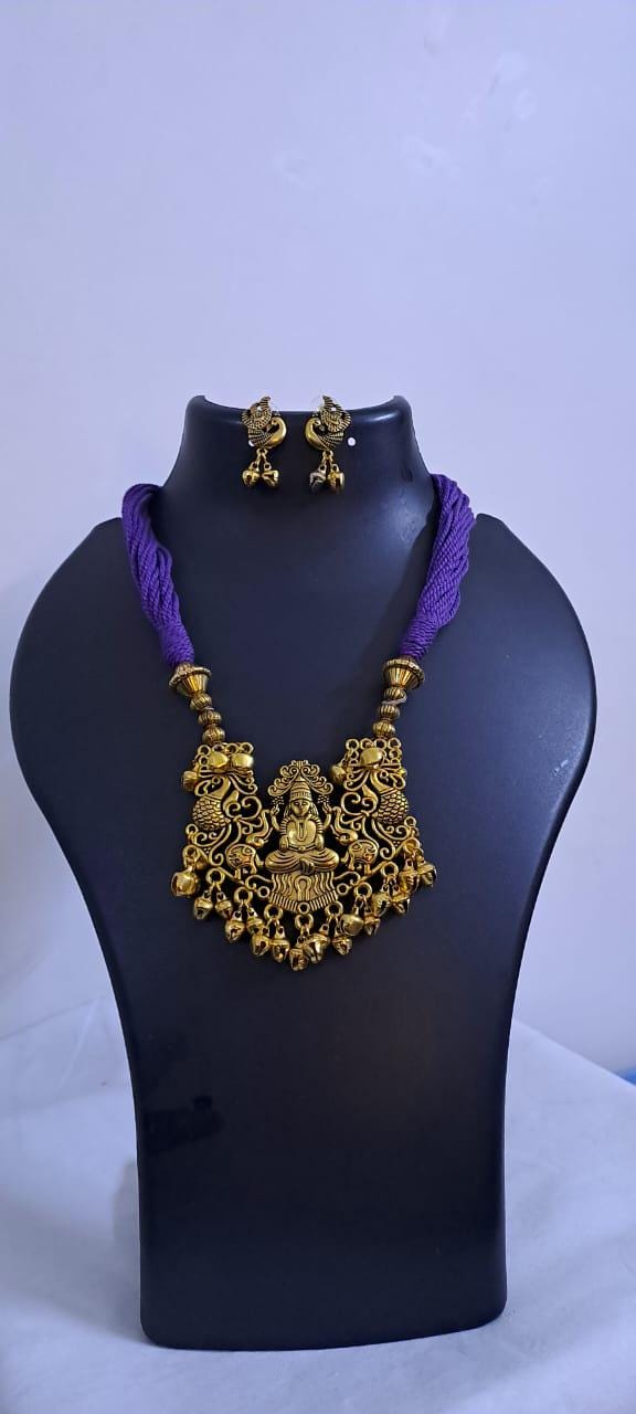 Purple thread necklace with Golden oxidised traditional pendant