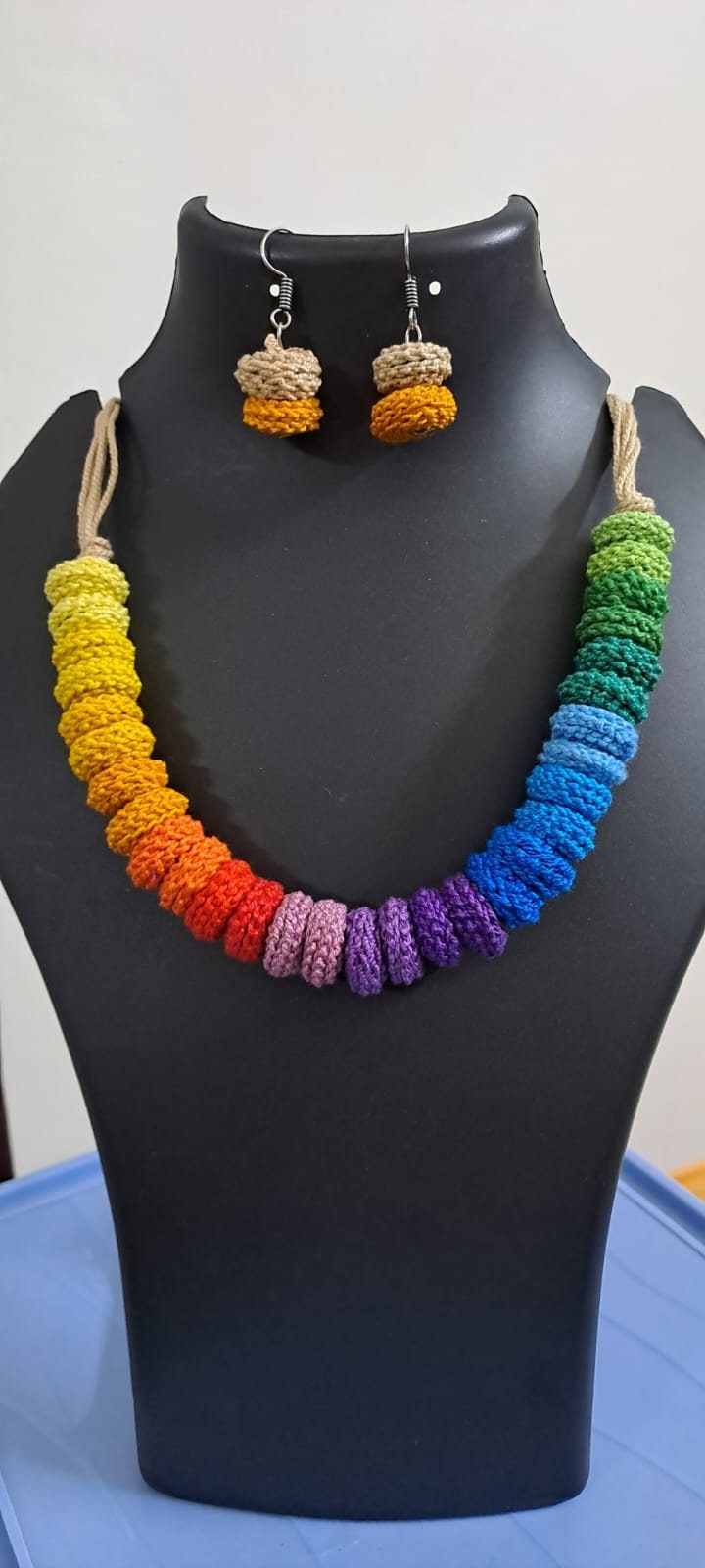 Exclusive multi coloured crochet necklace with colouful matching earrings.