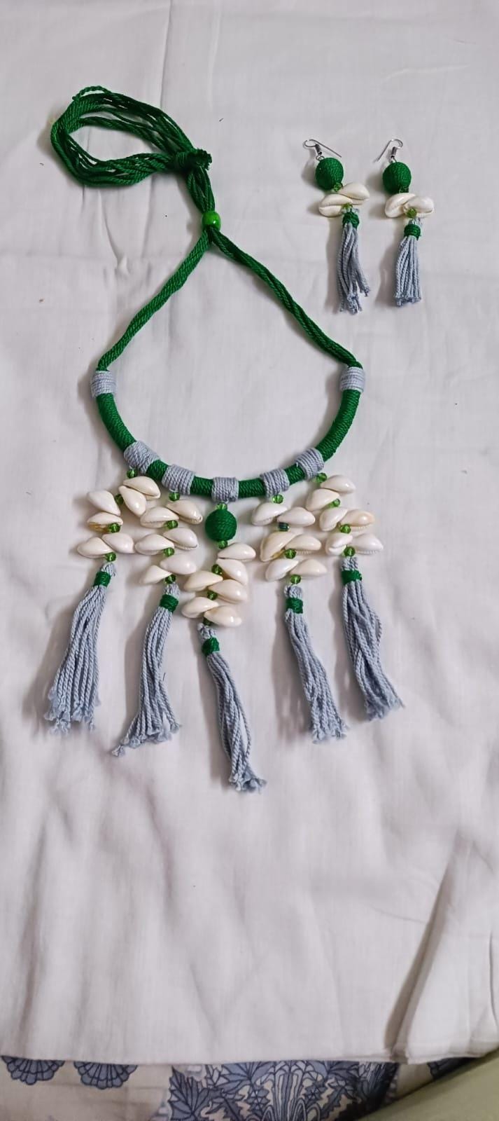 Exclusive green n grey hasuli thread necklace set with shell fringes n matching earrings