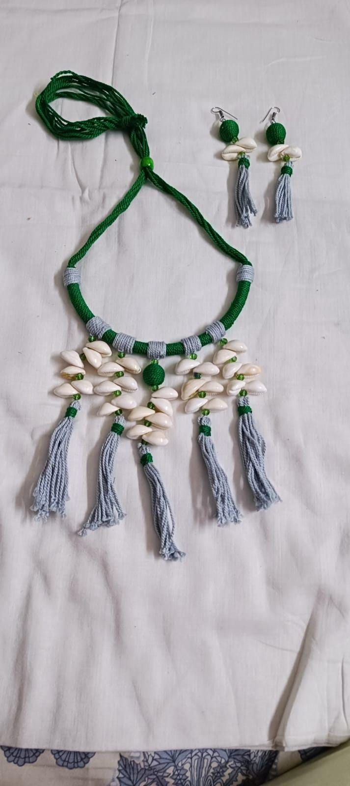 Exclusive green n grey hasuli thread necklace set with shell fringes n matching earrings