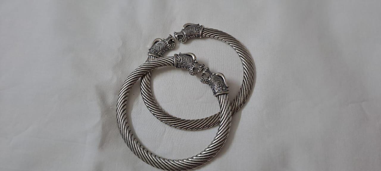 Traditional silver oxidised bangles with lion face