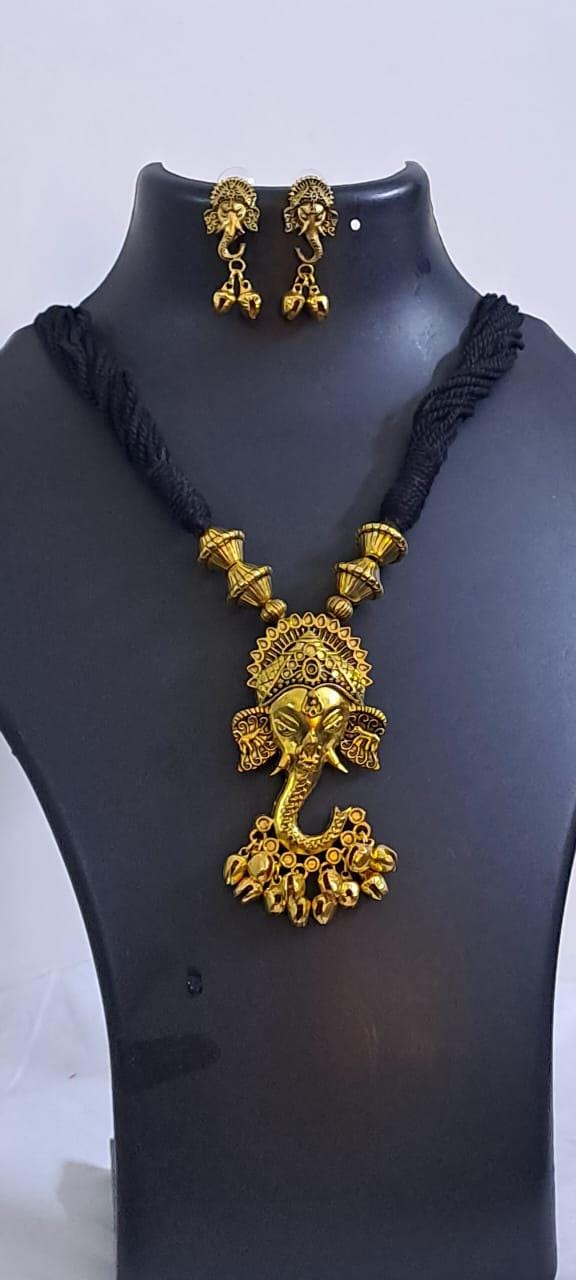 Black thread necklace with Golden oxidised traditional pendant