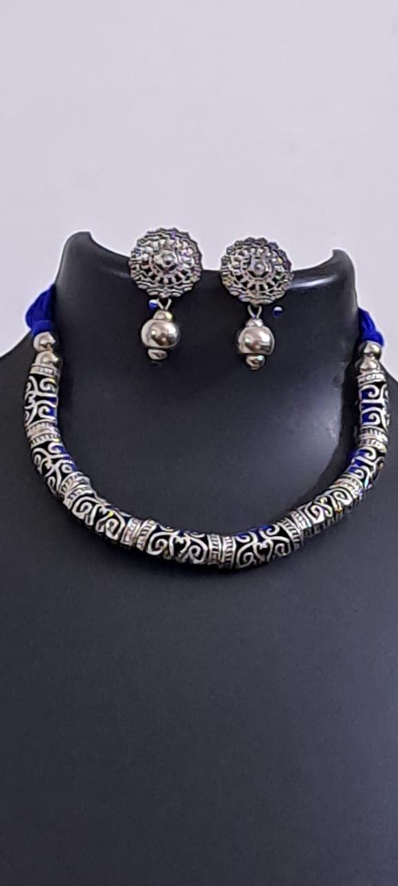 Exclusive silver oxidised hasuli set with matching earrings