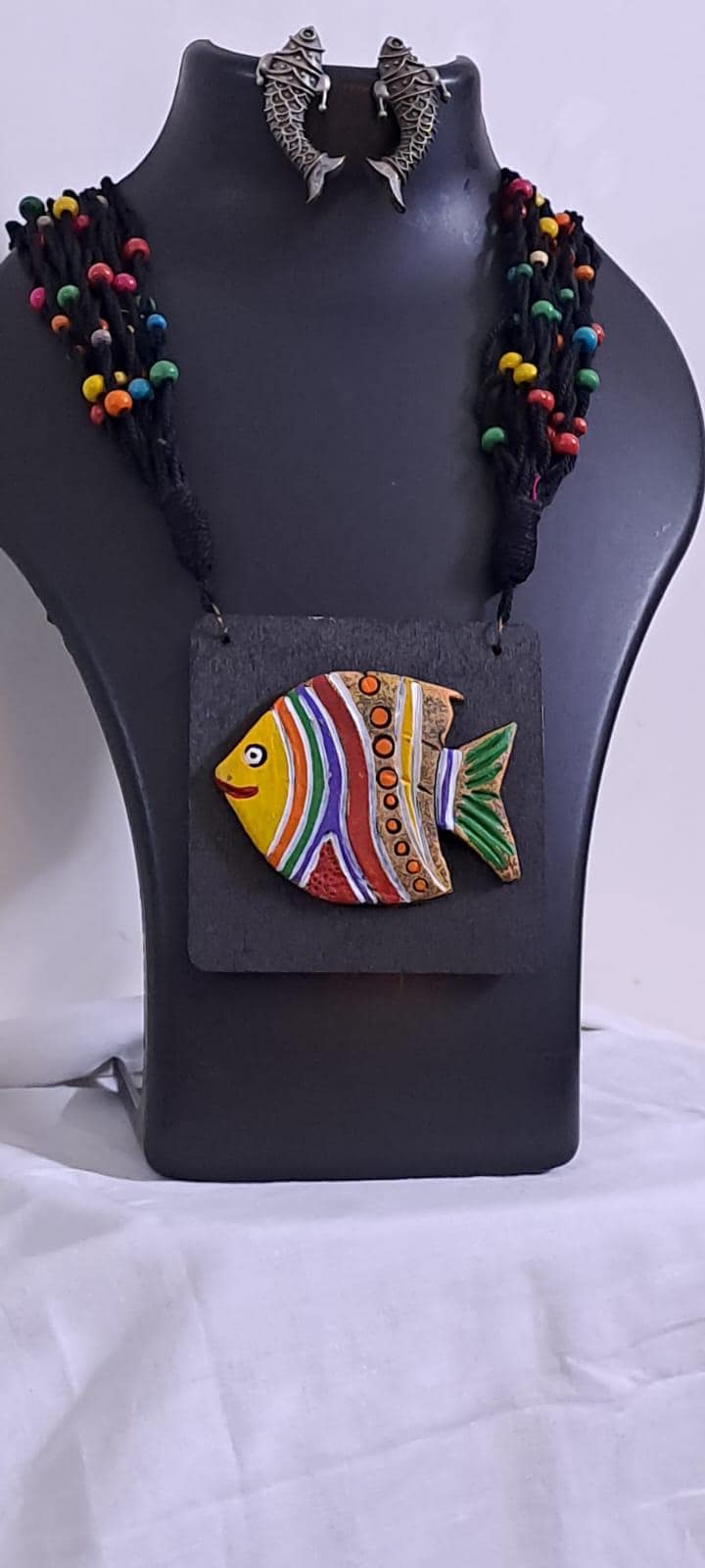 Terracotta fish pendant and thread necklace
