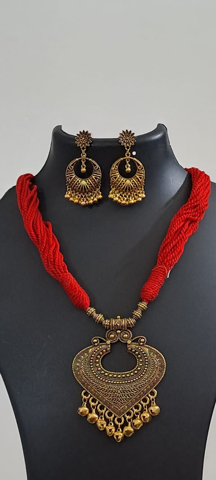 Red thread necklace with Golden oxidised traditional pendant