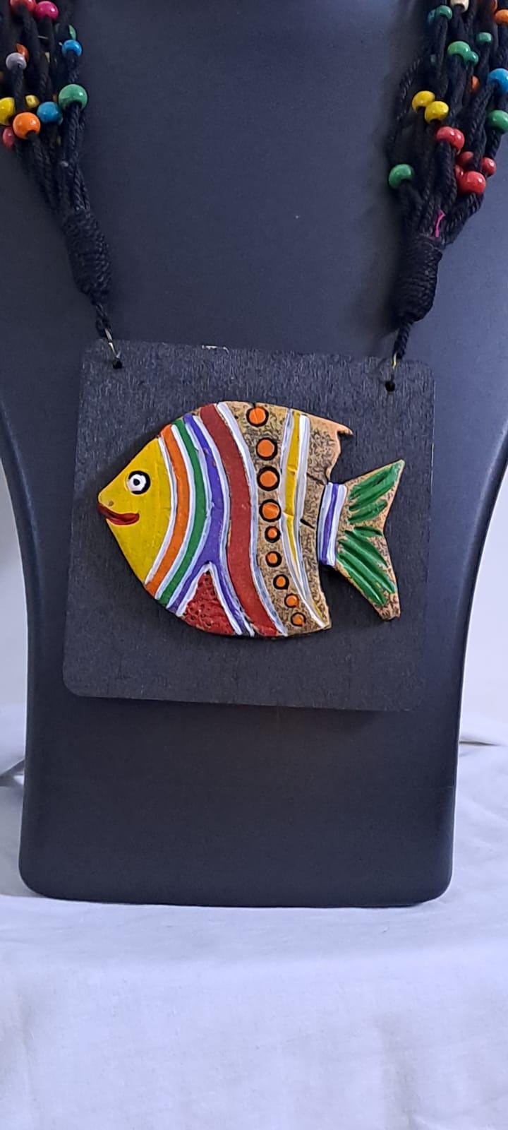 Terracotta fish pendant and thread necklace
