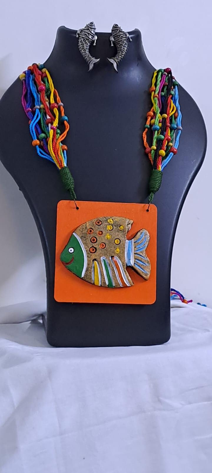 Terracotta fish pendant and thread necklace