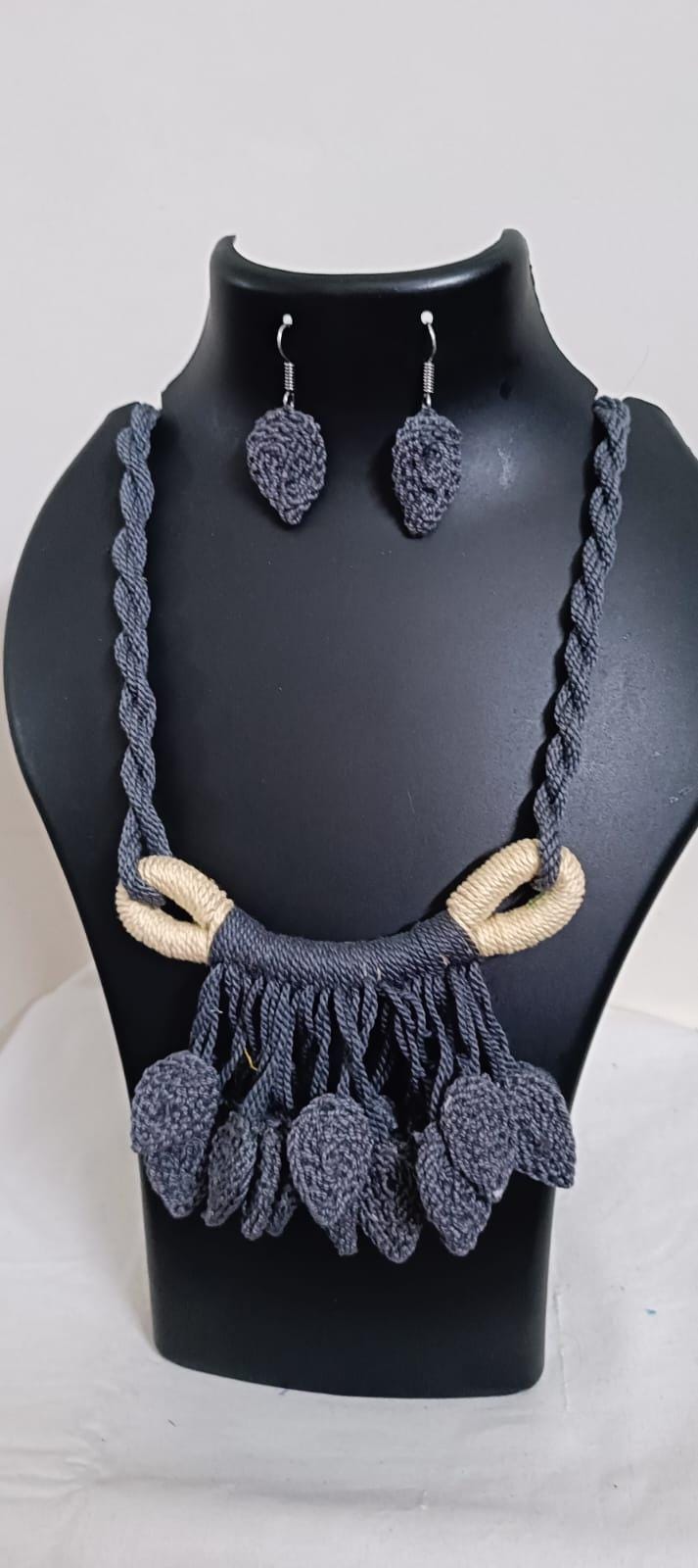 Grey Crochet thread necklace set with leaf fringes and matching earrings