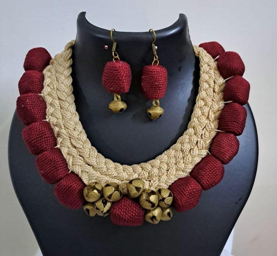Handmade braided thread necklace set with trinkets and  matching earrings