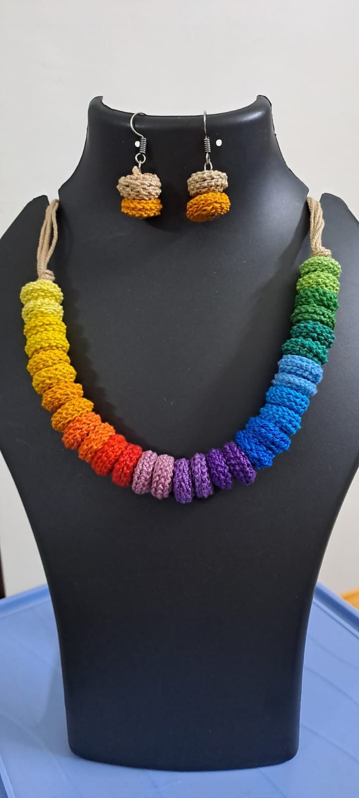 Exclusive multi coloured crochet necklace with colouful matching earrings.