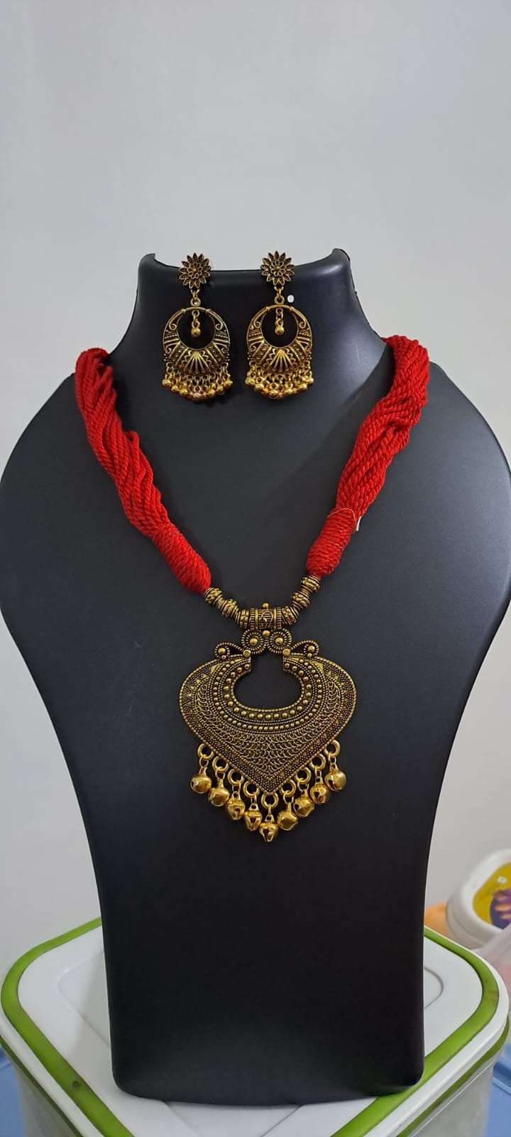 Red thread necklace with Golden oxidised traditional pendant