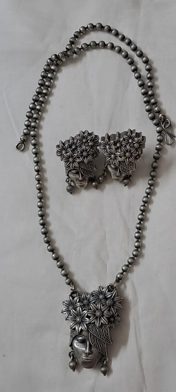 Exclusive n beautiful long chain with face pendant n matching earrings