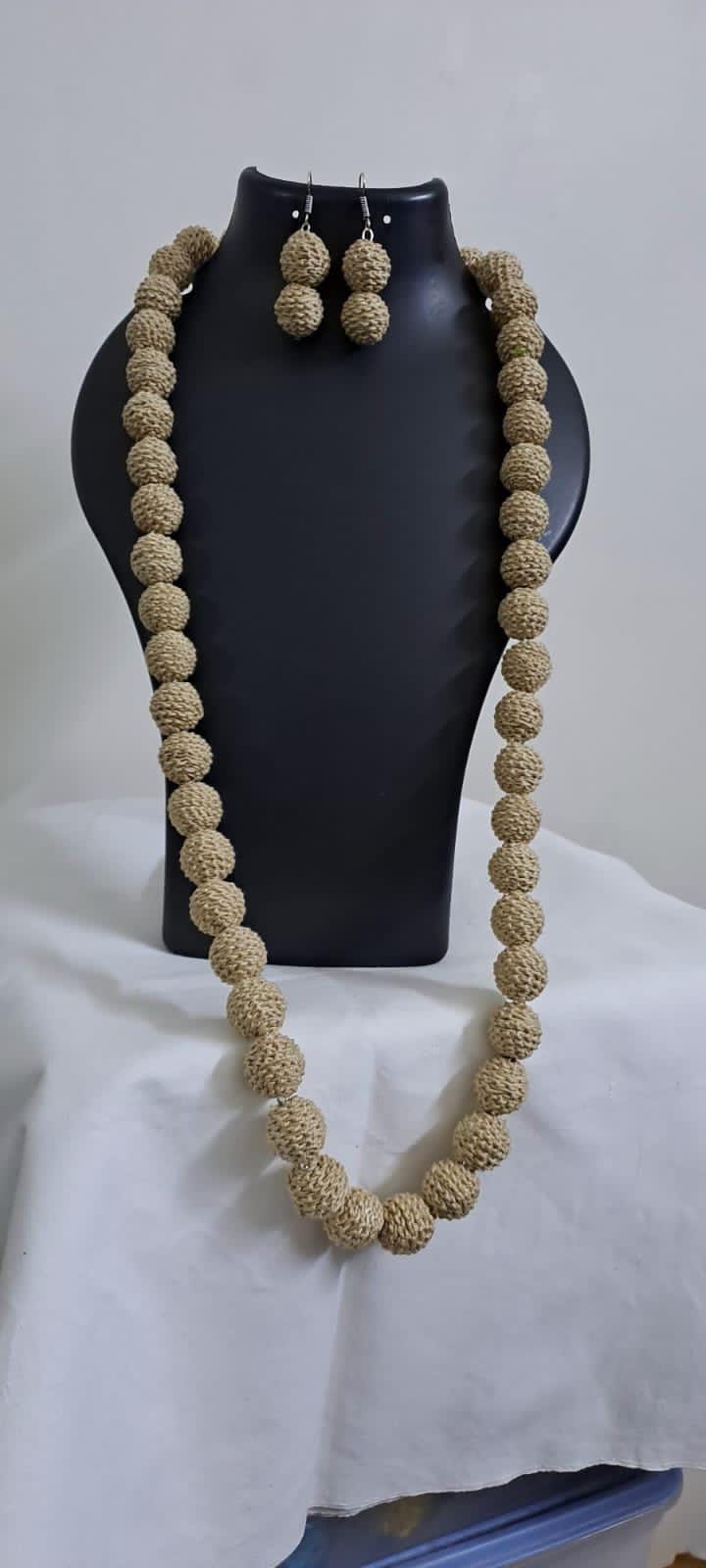 Exclusive beige colour thread beads long necklace set with matching earrings