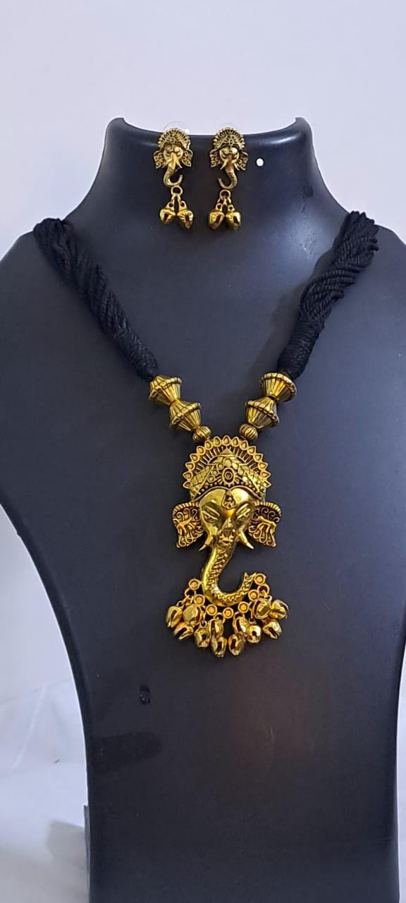 Black thread necklace with Golden oxidised traditional pendant