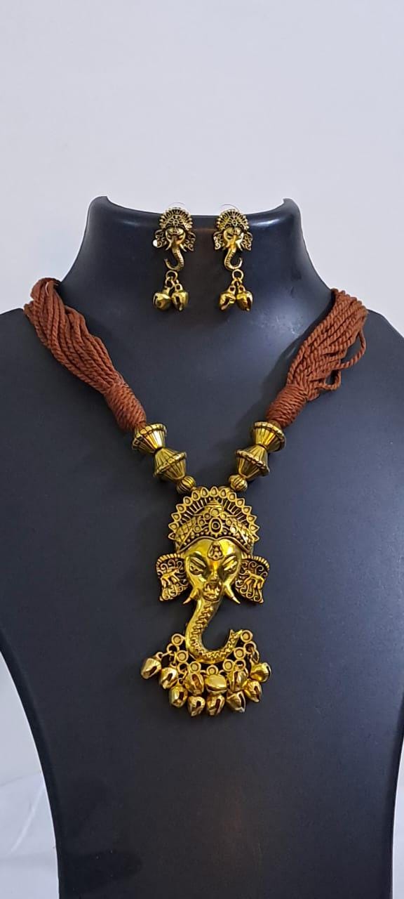 Brown thread necklace with Golden oxidised traditional pendant