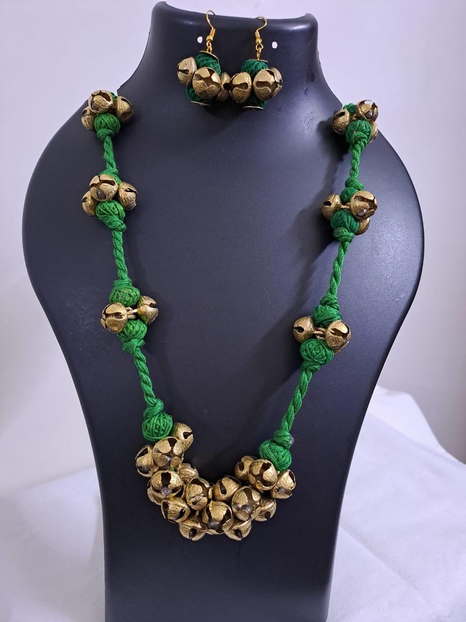 Green thread necklace set with trinkets n matching earrings