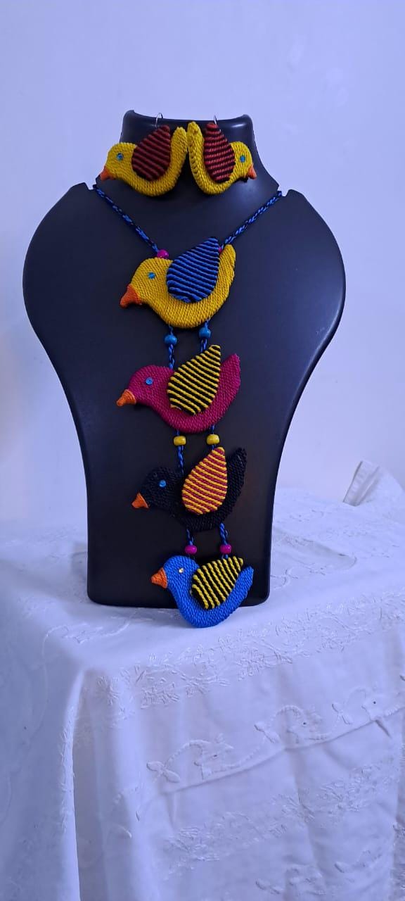 Multi coloured bird necklace and matching earrings