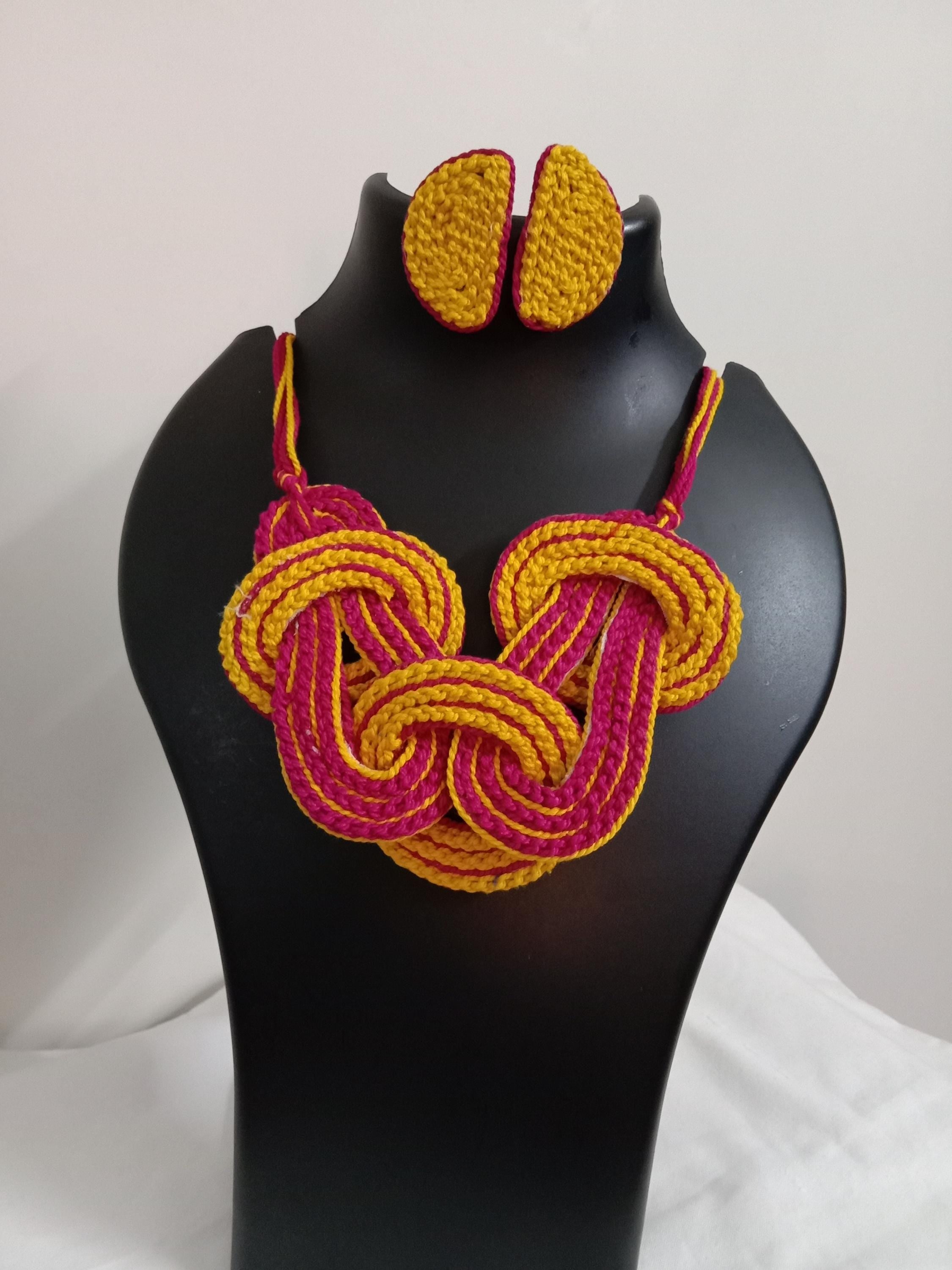 Celtic knot thread necklace with matching thread earrings.