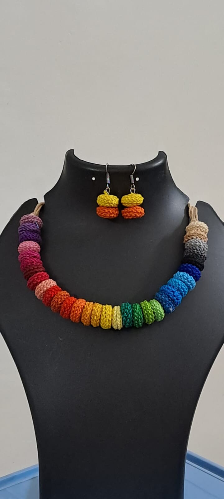 Exclusive multi coloured crochet necklace with colouful matching earrings.