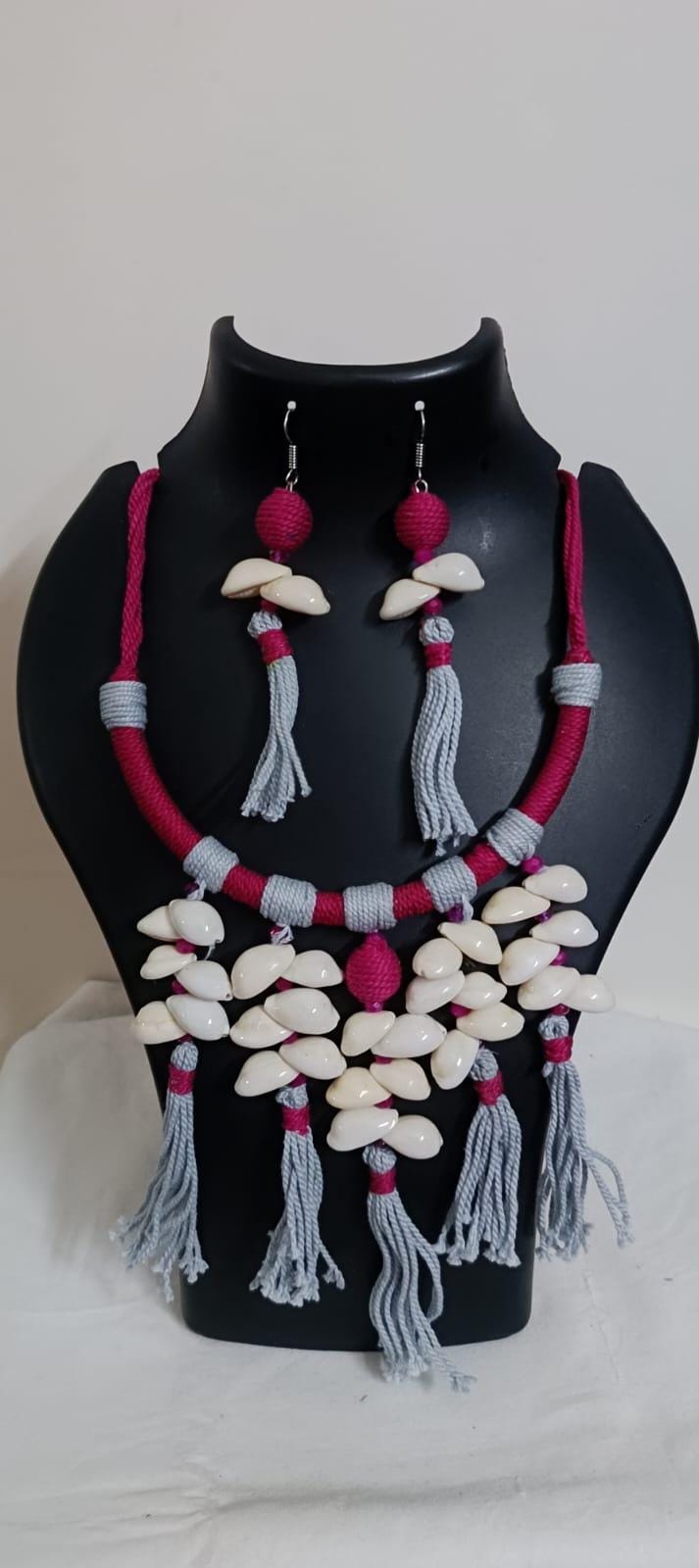 Exclusive pink n grey hasuli thread necklace set with shell fringes n matching earrings