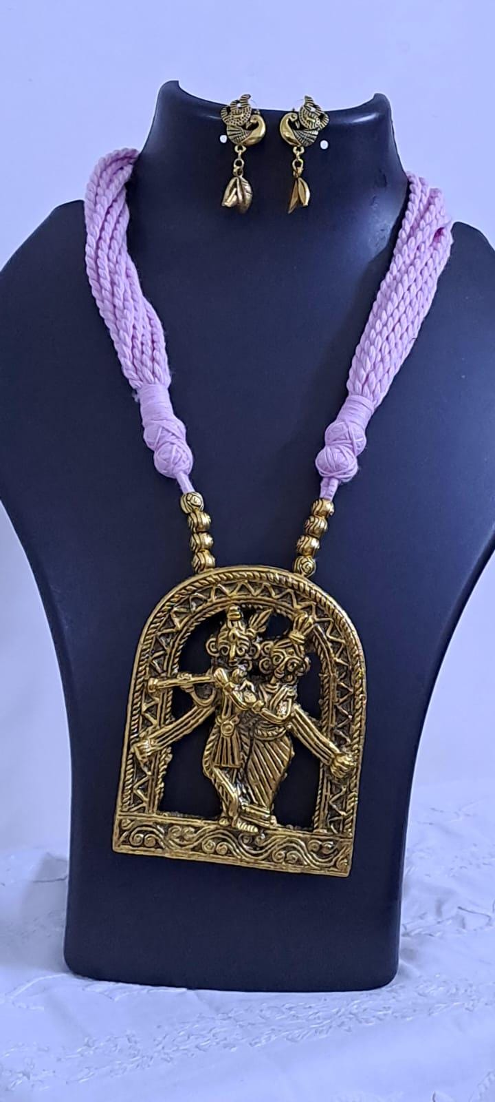 Radha Krishna golden oxidised pendant necklace in pink tread with matching earrings