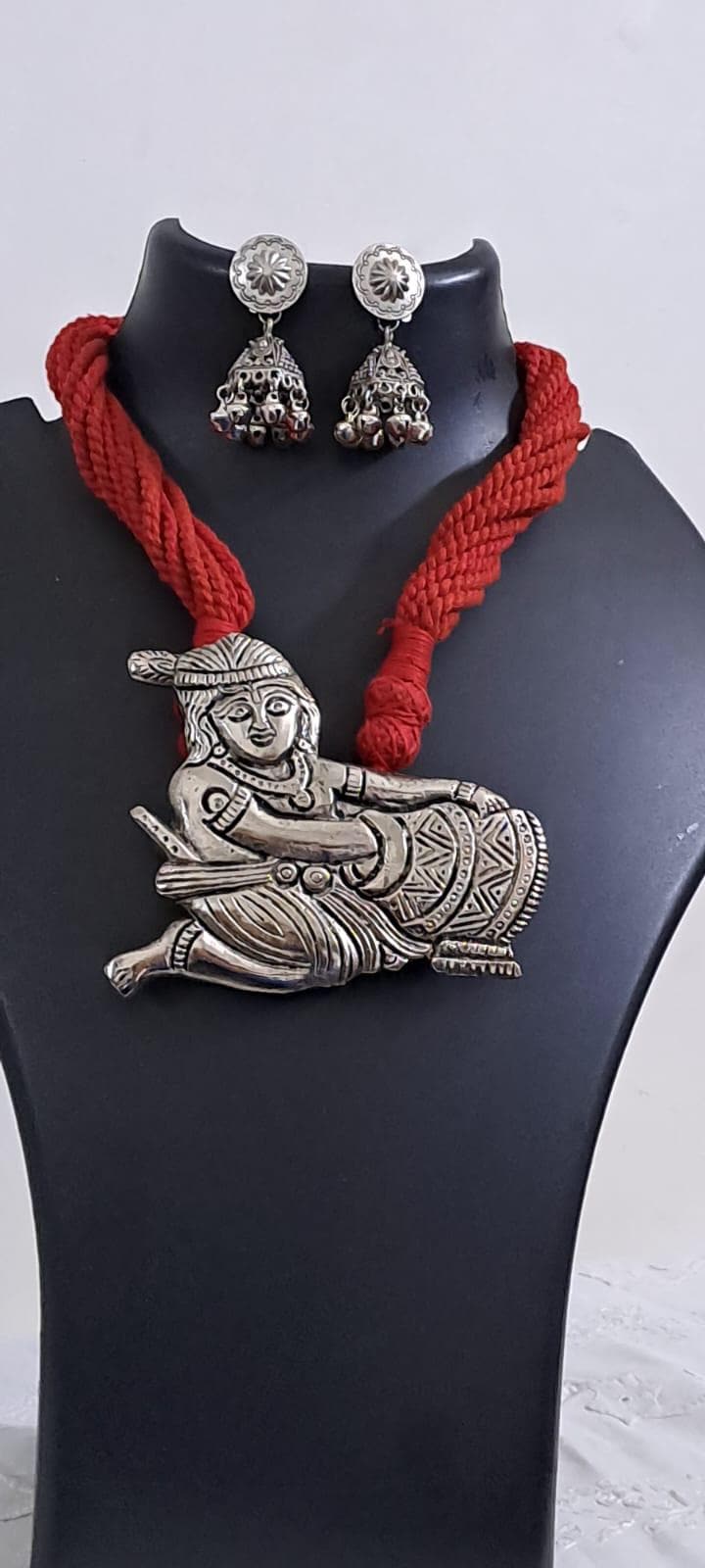 Red thread necklace with silver oxidised krishna pendant
