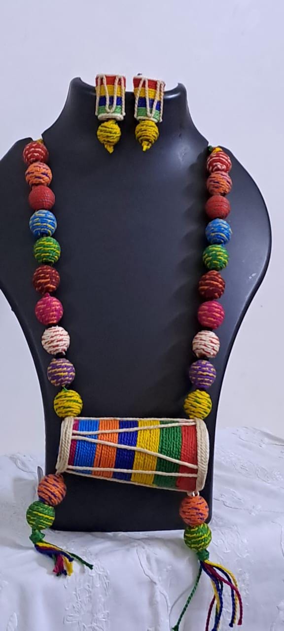 Multi coloured thread beads necklace set with dholak pendant and matching earrings