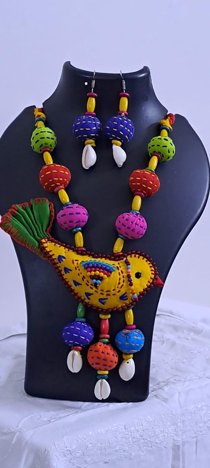 Exclusive fabric necklace with embroidered yellow fabric bird pendant and fabric beads n matching beads