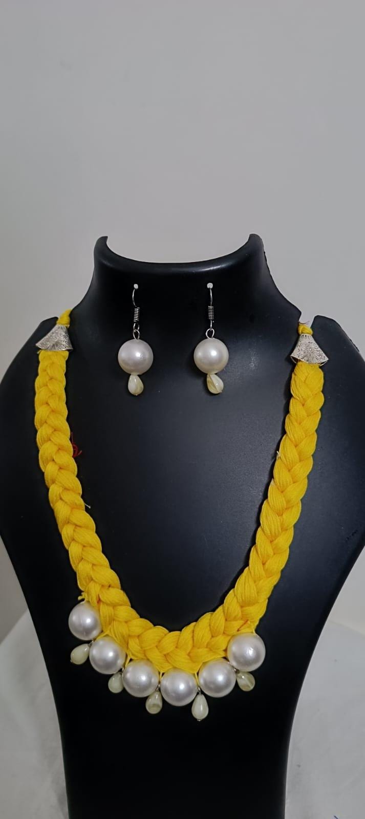 Yellow  braided thread necklace with pearl n pearl danglers