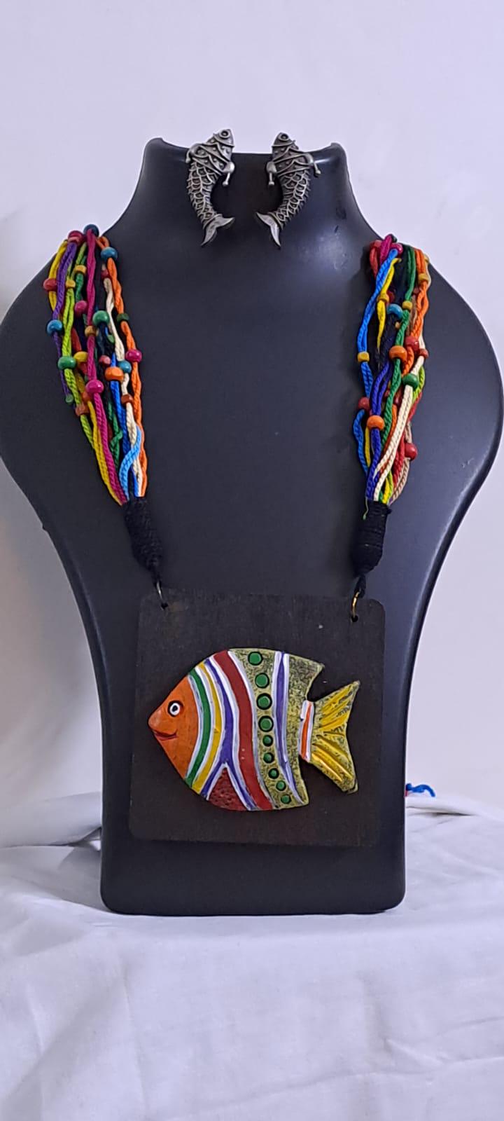 Terracotta fish pendant and thread necklace