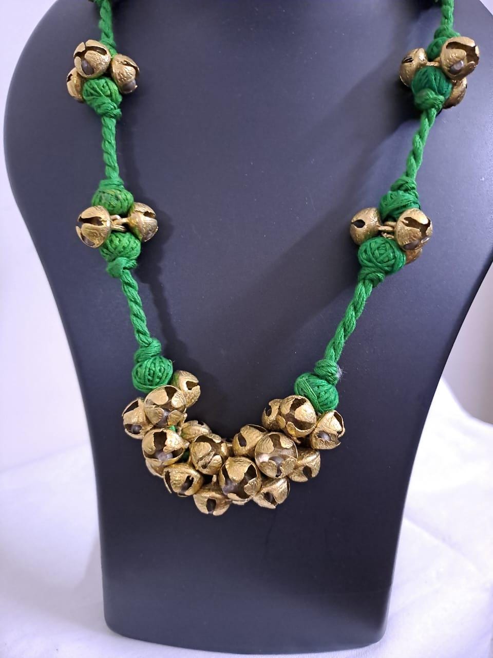 Green thread necklace set with trinkets n matching earrings